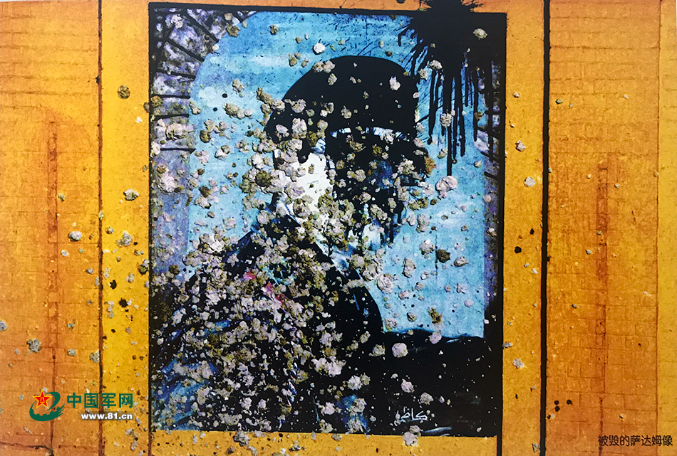 被毁的萨达姆像。赵建伟 摄影